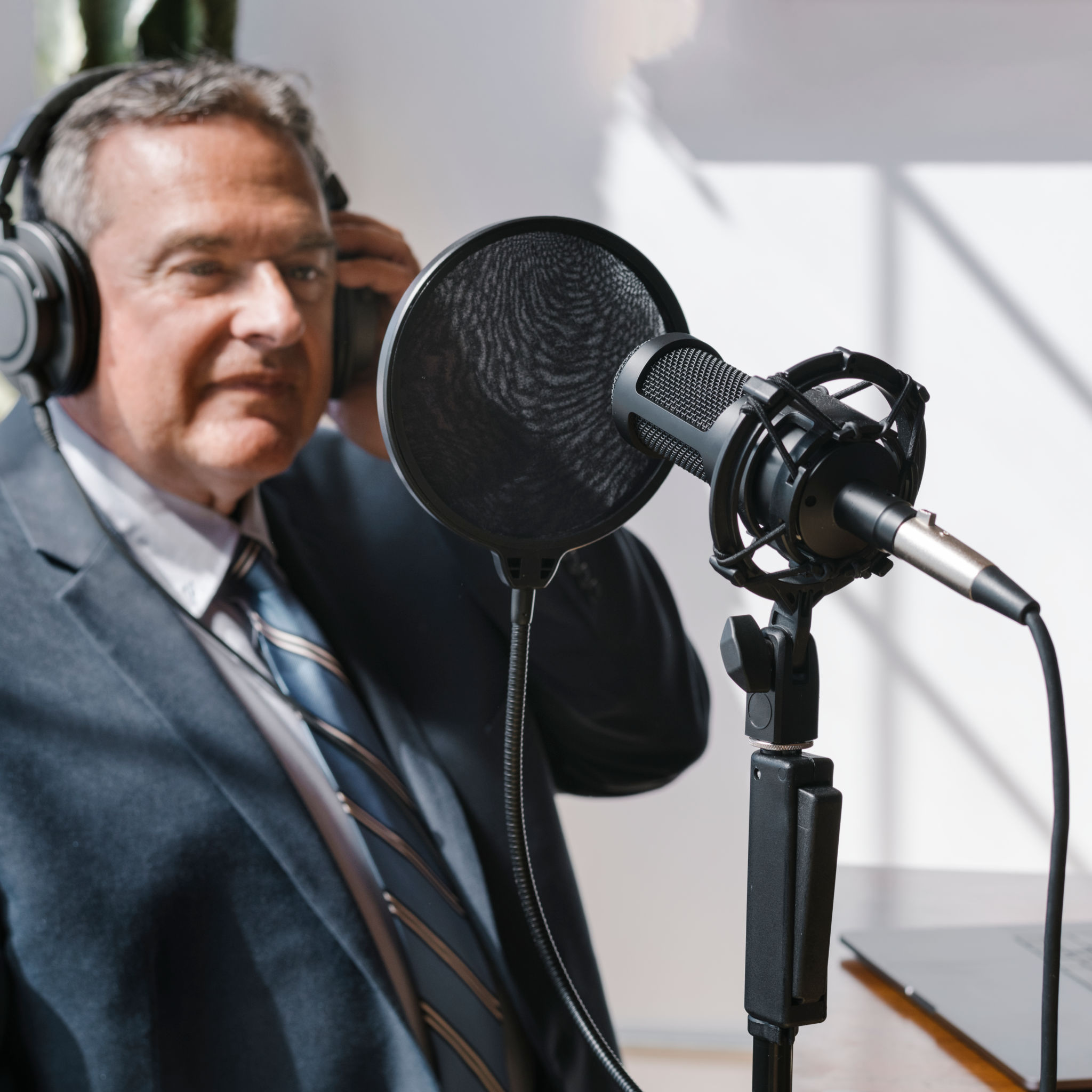 Radio broadcaster in studio